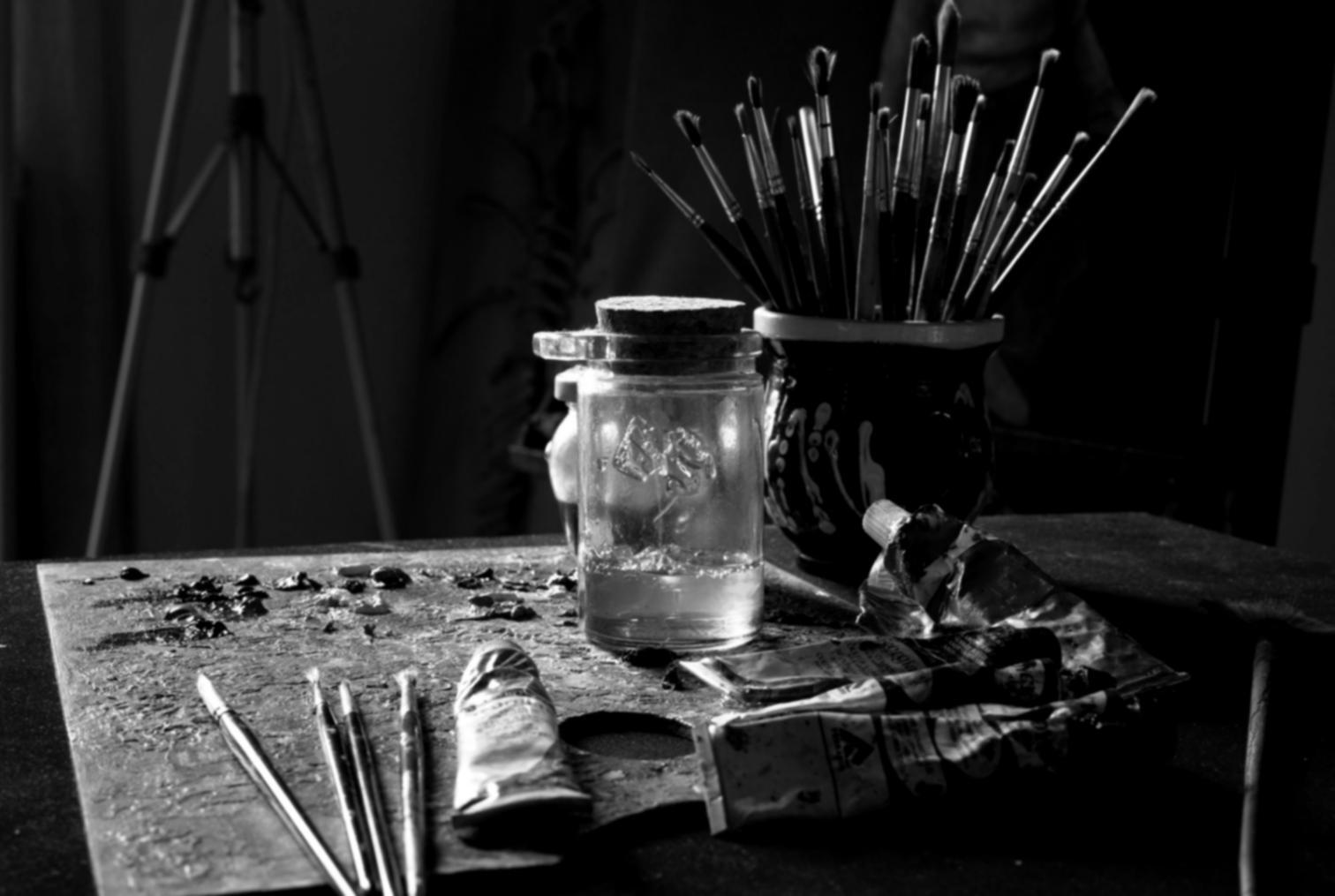 Collection of drawing materials and reference studies